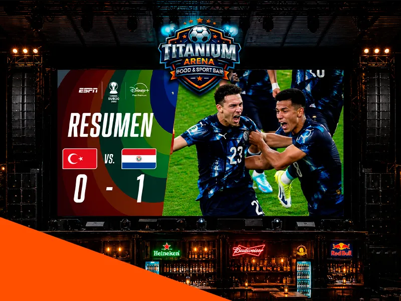 Espacio de sportbook junto a la pantalla gigante en Titanium Arena, Lambaré